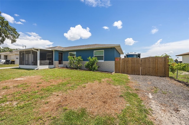 3983 Shay Dr, Bartow, FL 33830 - view of front of home featuring a sunroom and stone siding
