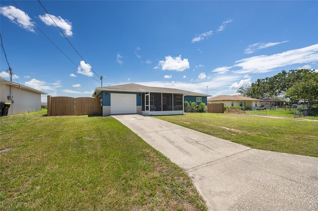 3983 Shay Dr, Bartow, FL 33830 - single story home featuring a sunroom, concrete driveway, an attached garage, and a gate