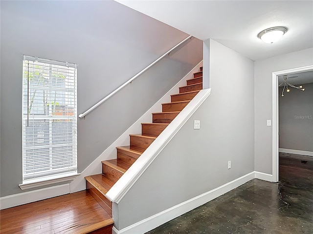 3111 W De Leon St Unit 2, Tampa, FL 33609 - stairs with baseboards and concrete floors