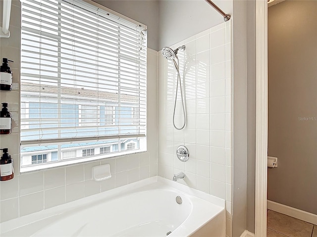 3111 W De Leon St Unit 2, Tampa, FL 33609 - bathroom with  shower combination, tile patterned flooring, and baseboards