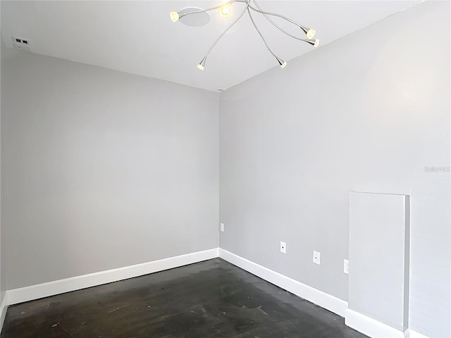 3111 W De Leon St Unit 2, Tampa, FL 33609 - empty room with baseboards and concrete flooring