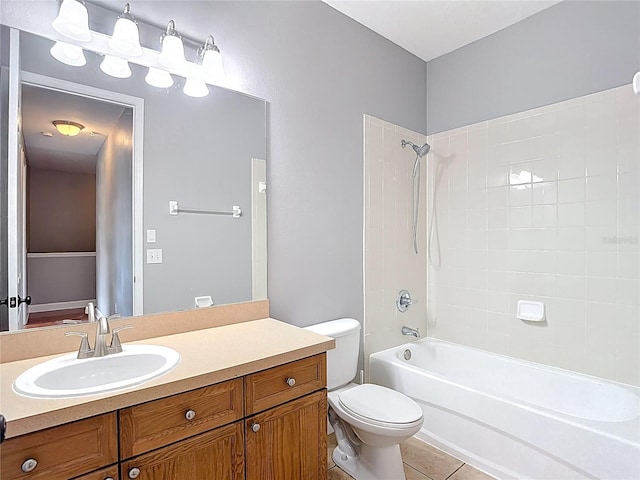 3111 W De Leon St Unit 2, Tampa, FL 33609 - bathroom featuring toilet, vanity, shower / bath combination, and tile patterned flooring