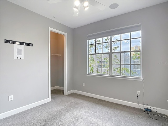 3111 W De Leon St Unit 2, Tampa, FL 33609 - unfurnished bedroom featuring baseboards, carpet floors, a closet, and ceiling fan