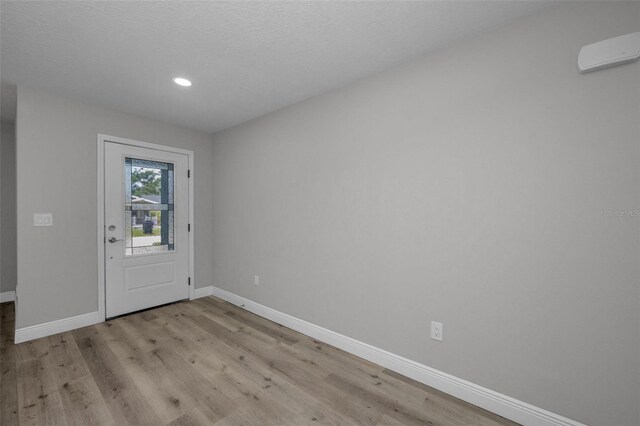 2307 N 47th St, Tampa, FL 33605 - entrance foyer featuring baseboards, light wood finished floors, and recessed lighting