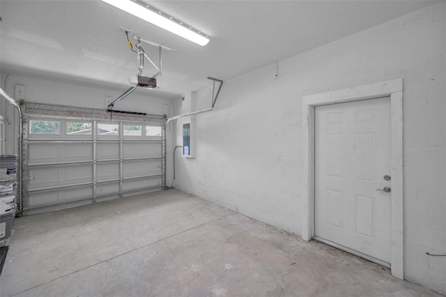2307 N 47th St, Tampa, FL 33605 - garage with a garage door opener and electric panel