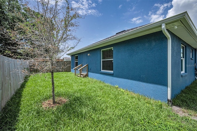 2307 N 47th St, Tampa, FL 33605 - view of home's exterior featuring stucco siding