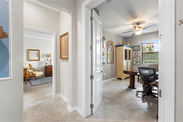 16898 Balance Cv, Land O Lakes, FL 34638 - office area featuring ceiling fan, light tile patterned floors, and baseboards
