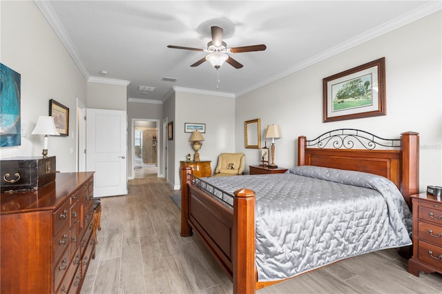 16898 Balance Cv, Land O Lakes, FL 34638 - bedroom featuring light wood finished floors, ornamental molding, ceiling fan, and baseboards