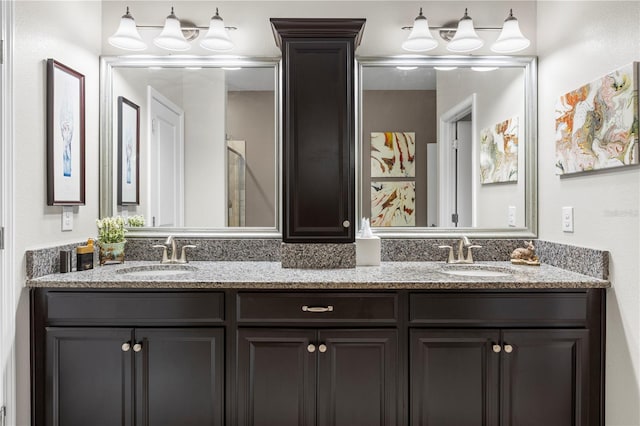 16898 Balance Cv, Land O Lakes, FL 34638 - bathroom featuring double vanity and a shower