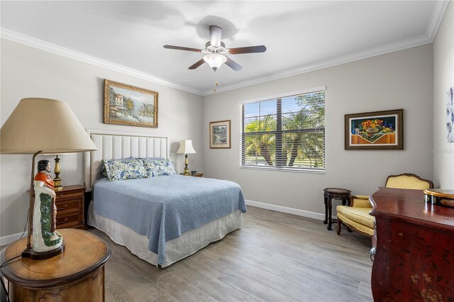 16898 Balance Cv, Land O Lakes, FL 34638 - bedroom with ornamental molding, baseboards, light wood-type flooring, and ceiling fan