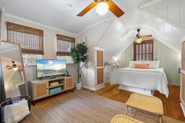 111 29th St W, Bradenton, FL 34205 - bedroom with light wood finished floors, lofted ceiling, ornamental molding, and ceiling fan