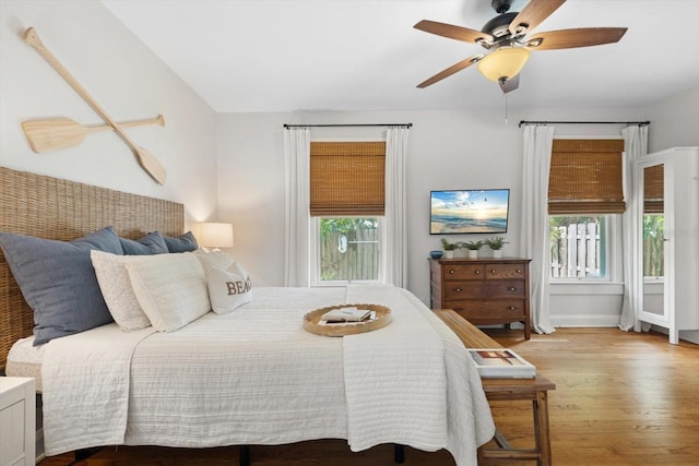 111 29th St W, Bradenton, FL 34205 - bedroom with wood finished floors and ceiling fan