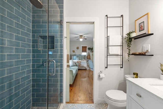 111 29th St W, Bradenton, FL 34205 - full bath featuring connected bathroom, a shower stall, vanity, and a ceiling fan