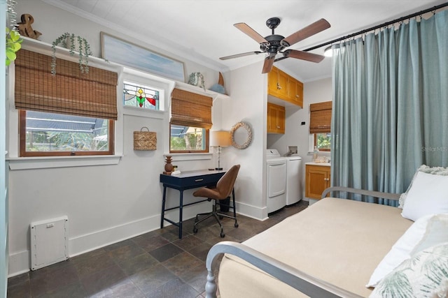 111 29th St W, Bradenton, FL 34205 - bedroom with washing machine and clothes dryer, crown molding, multiple windows, and dark stone finish floors