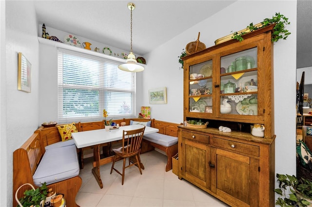 1051 Glynwood Pl, Dunedin, FL 34698 - dining space featuring breakfast area and a wainscoted wall