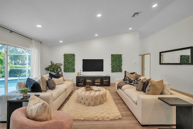 16106 Worlington Pl, Odessa, FL 33556 - living room featuring light wood-type flooring, recessed lighting, and baseboards