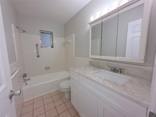 2045 Summit Dr, Dunedin, FL 34698 - full bathroom with toilet, vanity, bathing tub / shower combination, and tile patterned flooring