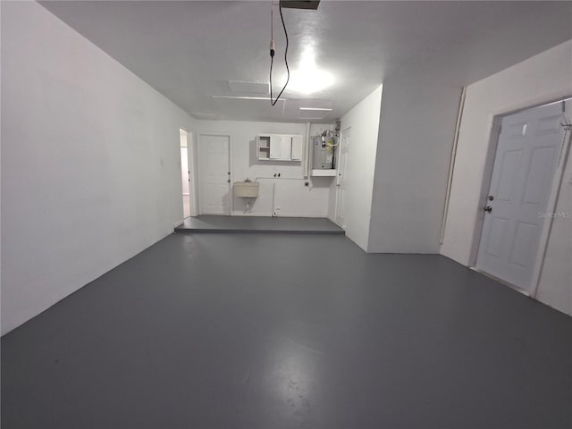 2045 Summit Dr, Dunedin, FL 34698 - garage with strapped water heater