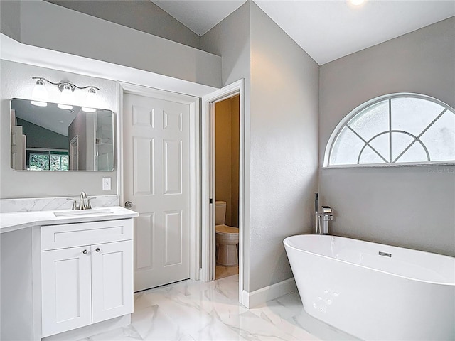 5809 Silas Creek Ln, Wesley Chapel, FL 33545 - bathroom with a freestanding bath, vanity, and marble look tiles