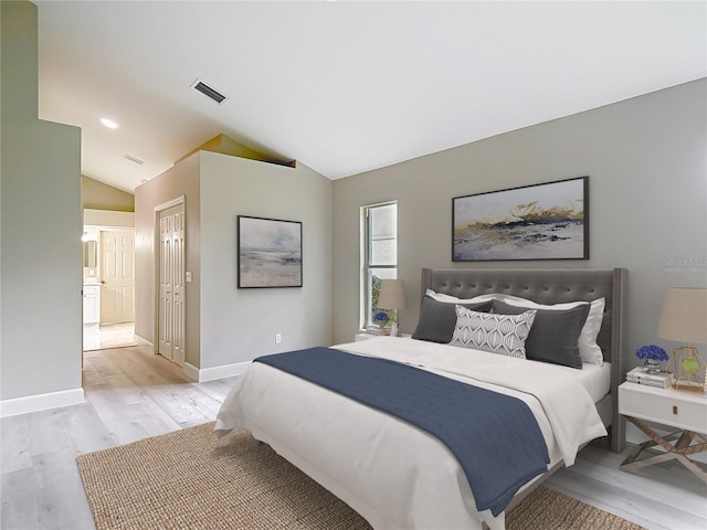 5809 Silas Creek Ln, Wesley Chapel, FL 33545 - bedroom with light wood-type flooring and lofted ceiling