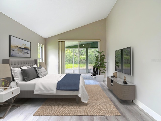 5809 Silas Creek Ln, Wesley Chapel, FL 33545 - bedroom with wood finished floors, access to exterior, and high vaulted ceiling