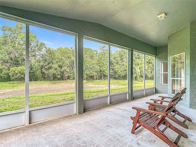 5809 Silas Creek Ln, Wesley Chapel, FL 33545 - sunroom featuring lofted ceiling