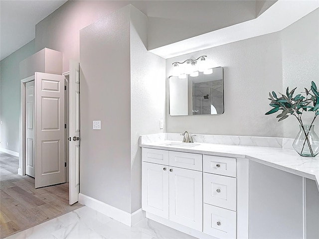 5809 Silas Creek Ln, Wesley Chapel, FL 33545 - bathroom featuring vanity and marble look tiles