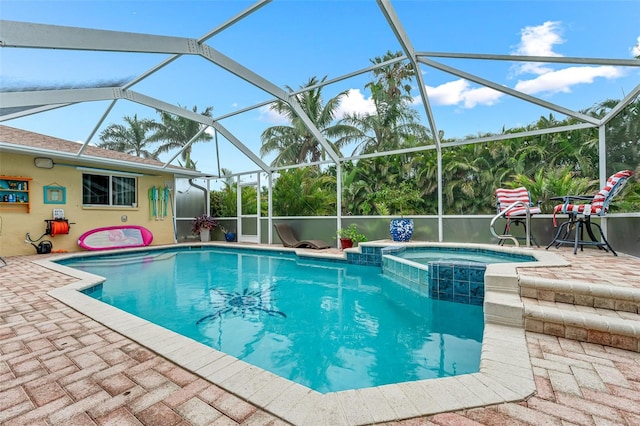 2812 SW 29th Ave, Cape Coral, FL 33914 - view of pool featuring a patio area, a lanai, and a pool with connected hot tub