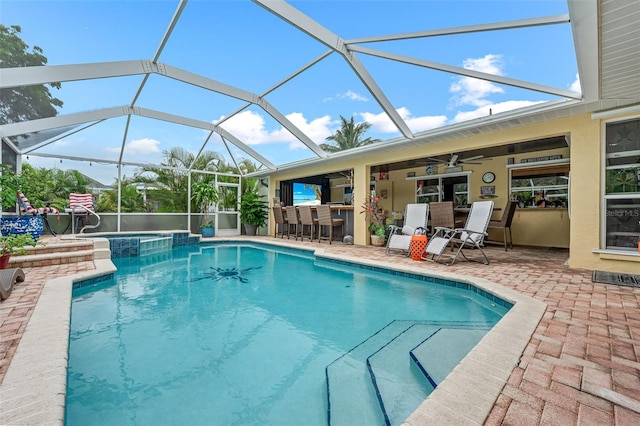 2812 SW 29th Ave, Cape Coral, FL 33914 - view of swimming pool featuring a patio, ceiling fan, and a lanai