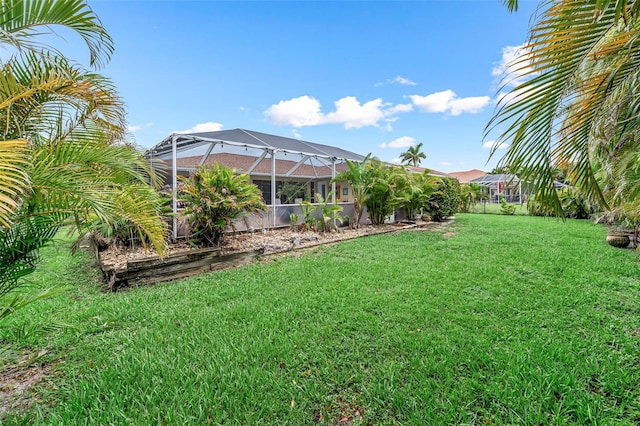 2812 SW 29th Ave, Cape Coral, FL 33914 - view of grassy yard featuring glass enclosure