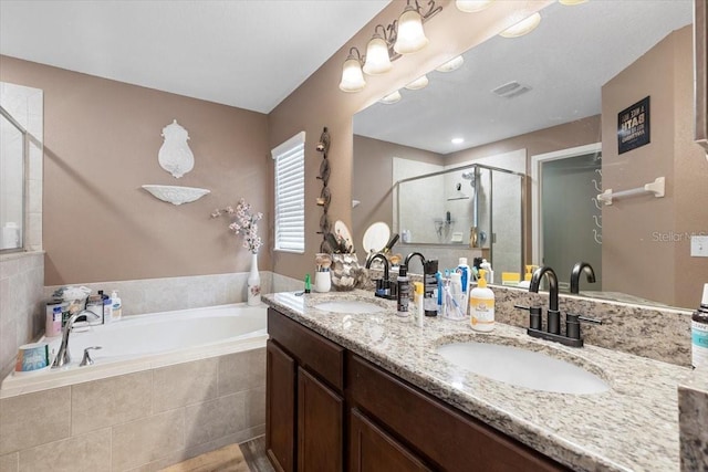 12026 Crestridge Loop, New Port Richey, FL 34655 - full bath with a bath, a stall shower, and double vanity