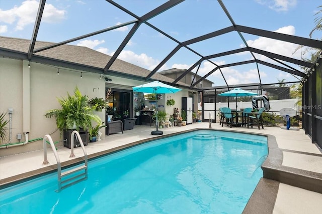 12026 Crestridge Loop, New Port Richey, FL 34655 - swimming pool with a patio and glass enclosure