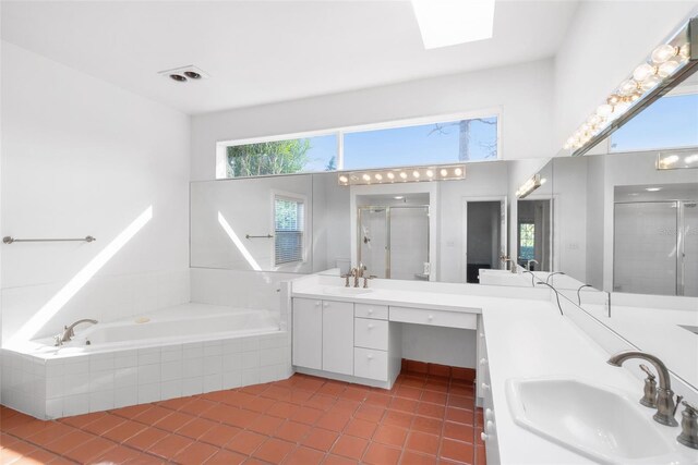 15612 Howell Park Ln, Tampa, FL 33625 - bathroom with tile patterned floors, a bath, a shower stall, and double vanity