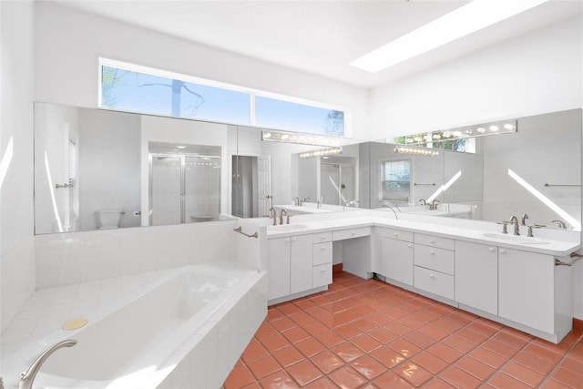 15612 Howell Park Ln, Tampa, FL 33625 - full bath with a bath, double vanity, a stall shower, and tile patterned flooring