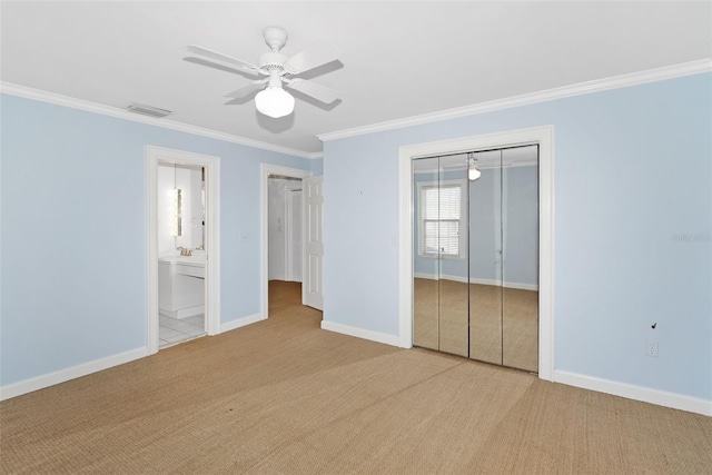 15612 Howell Park Ln, Tampa, FL 33625 - unfurnished bedroom with carpet floors, ornamental molding, a closet, baseboards, and a ceiling fan