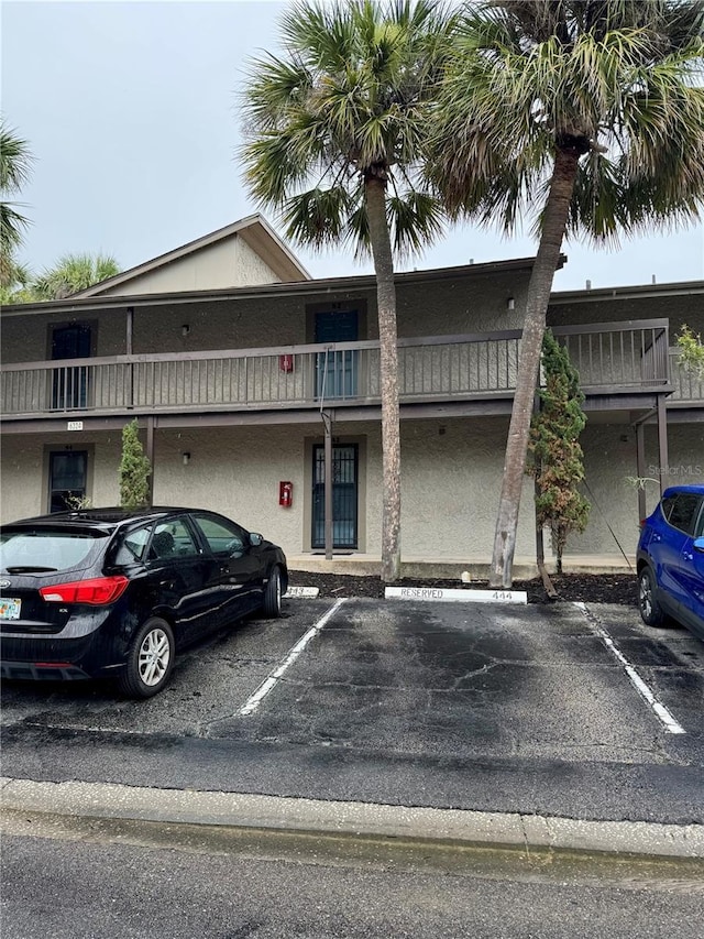 6324 Newtown Cir Unit 24B2, Tampa, FL 33615 - view of property with uncovered parking