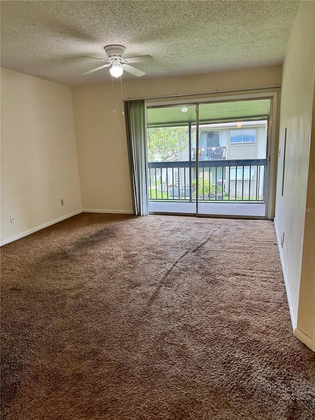 6324 Newtown Cir Unit 24B2, Tampa, FL 33615 - carpeted spare room featuring a textured ceiling, ceiling fan, and baseboards