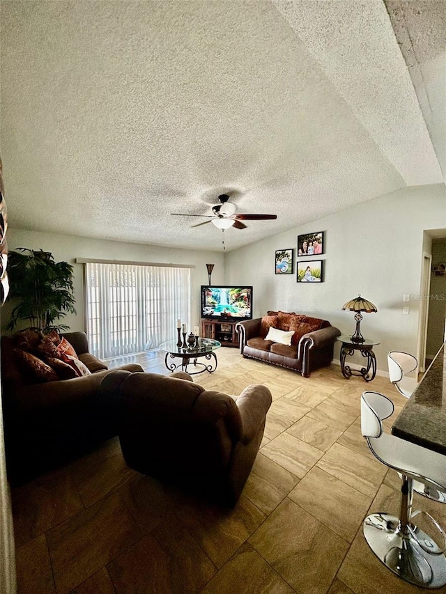 11521 Paperwood Pl, Riverview, FL 33579 - living area with ceiling fan and a textured ceiling