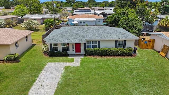 8339 75th Ave, Seminole, FL 33777 - view of front of home featuring roof with shingles, a residential view, and stucco siding