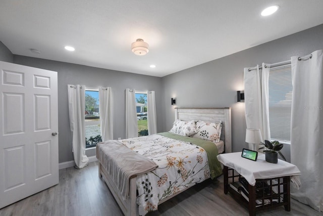 8339 75th Ave, Seminole, FL 33777 - bedroom with wood finished floors, recessed lighting, and baseboards