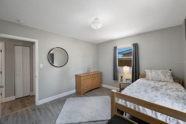 8339 75th Ave, Seminole, FL 33777 - bedroom with wood finished floors and baseboards