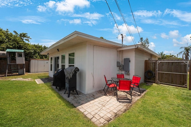8339 75th Ave, Seminole, FL 33777 - back of property featuring a patio and a gate