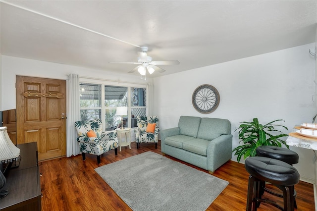 4154 56th St N Unit 720, Kenneth City, FL 33709 - living area featuring ceiling fan and dark wood-type flooring