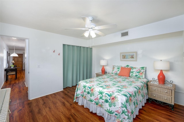 4154 56th St N Unit 720, Kenneth City, FL 33709 - bedroom with wood finished floors and a ceiling fan