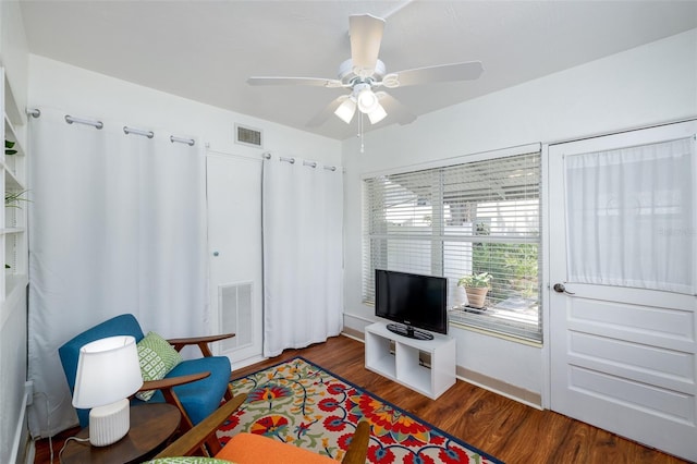 4154 56th St N Unit 720, Kenneth City, FL 33709 - living area with ceiling fan and wood finished floors