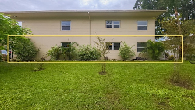 4154 56th St N Unit 720, Kenneth City, FL 33709 - view of home's exterior featuring a yard