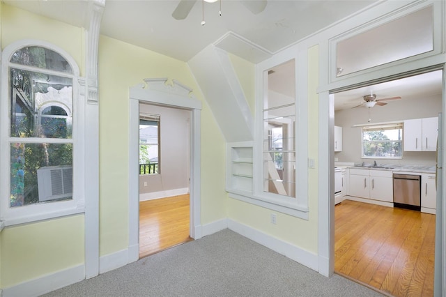 824 31st Ave N, Saint Petersburg, FL 33704 - hall featuring baseboards, light carpet, and cooling unit