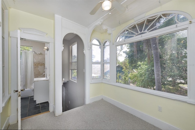 824 31st Ave N, Saint Petersburg, FL 33704 - unfurnished sunroom with plenty of natural light and arched walkways