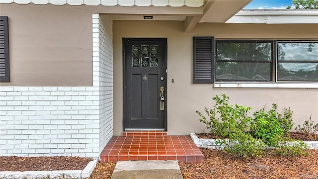 1737 Prince Philip St, Clearwater, FL 33755 - view of exterior entry with brick siding and stucco siding