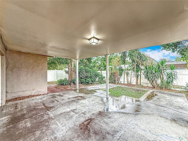 1737 Prince Philip St, Clearwater, FL 33755 - fenced backyard with a patio area